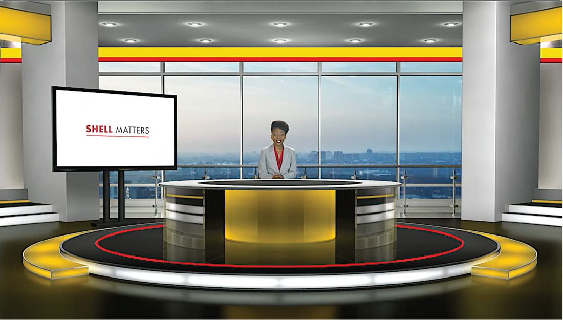 A presenter at the desk of the Shell Matters news studio